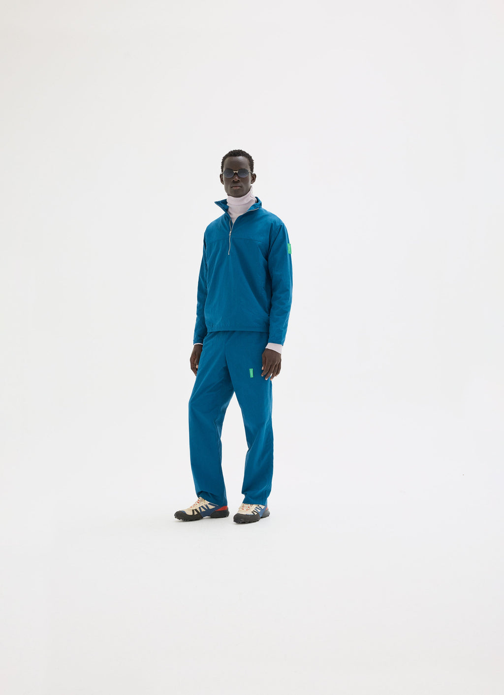 Half-Zip Nylon Windbreaker styled as a full outfit look by District Vision