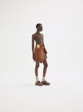 High Neck Interlock Bra in Earth styled as a full outfit look by District Vision