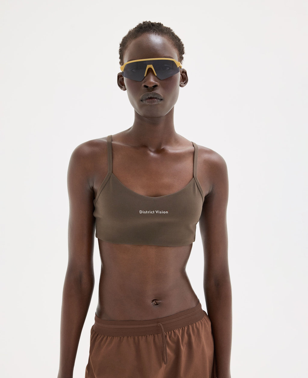 Light Support Interlock Bra in Earth styled as a full outfit look by District Vision