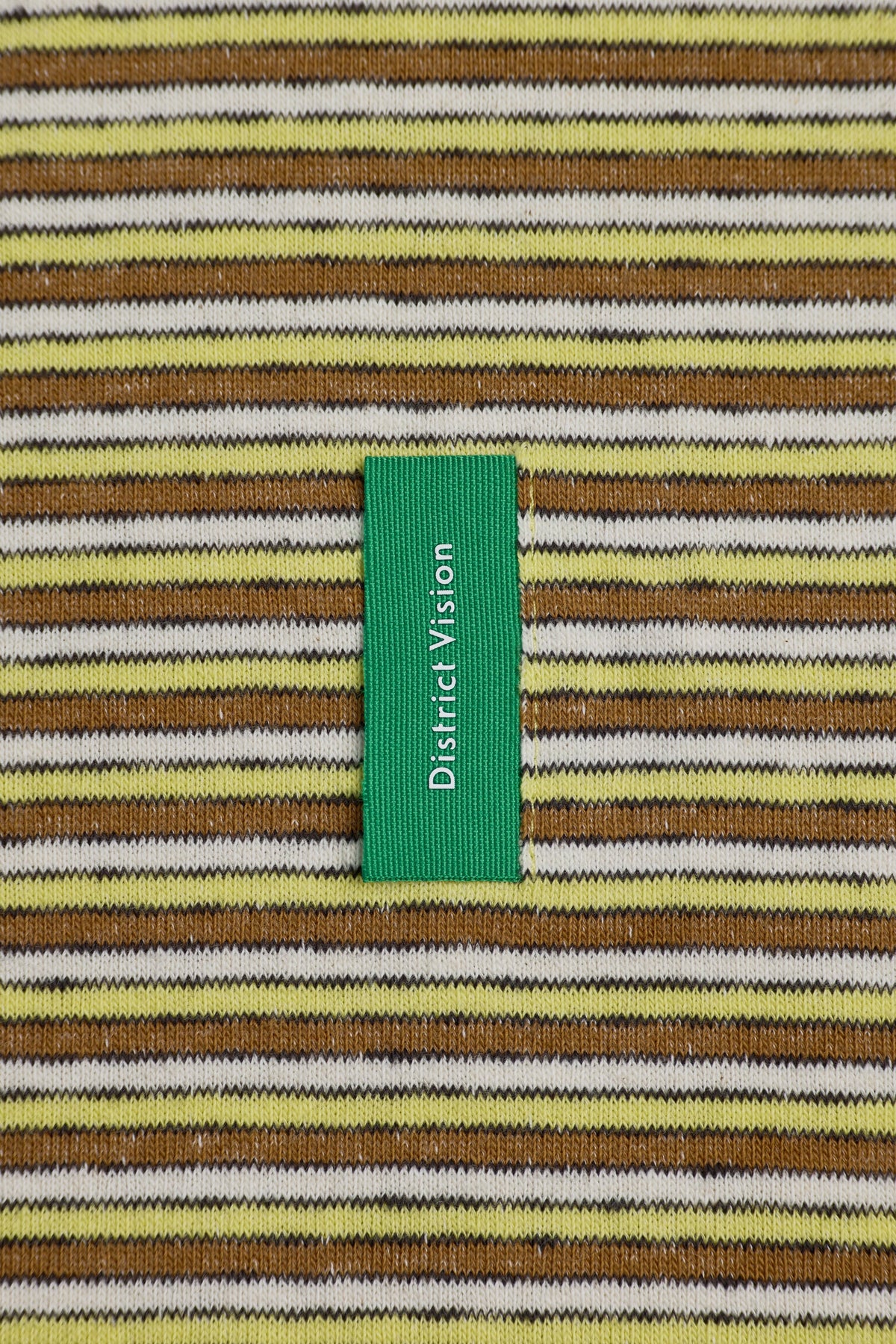 Long Sleeve Stripe Tee in Yellow Stripe by District Vision - label detail