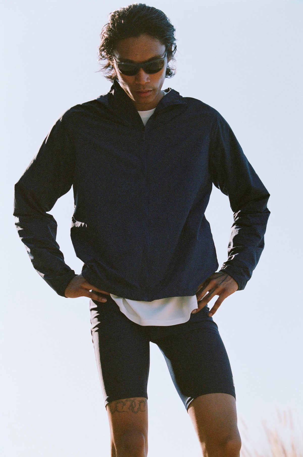 Ultralight Nylon Wind Jacket in Obsidian styled as a full outfit look by District Vision
