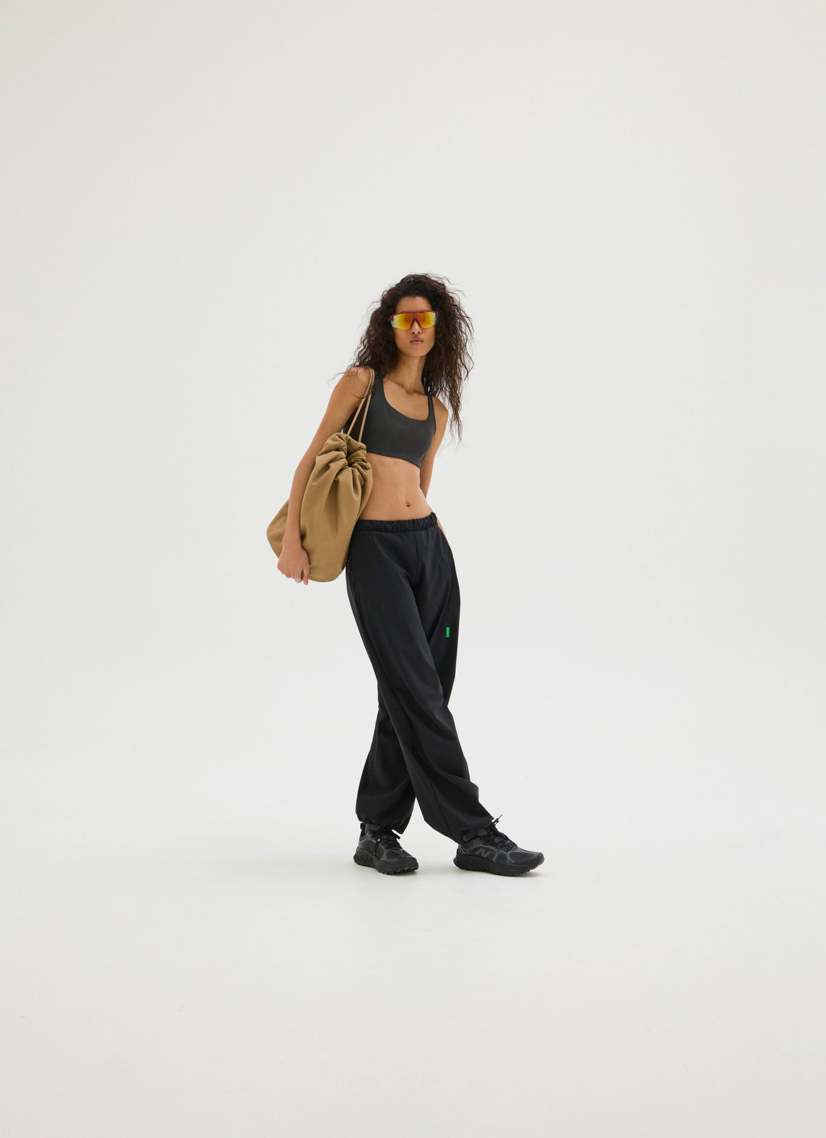 Wide Leg Pants in Black styled as a full outfit look by District Vision